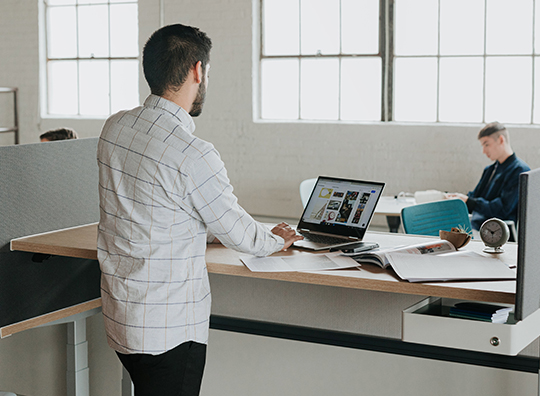 Haworth Height Adjustable table in a office space