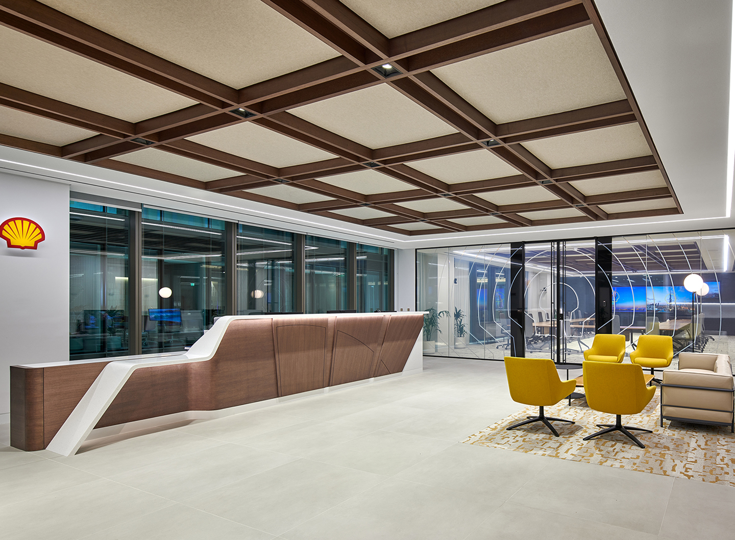 The Shell's inviting reception area showcases the company's Middle East presence and distinctive brand elements. 