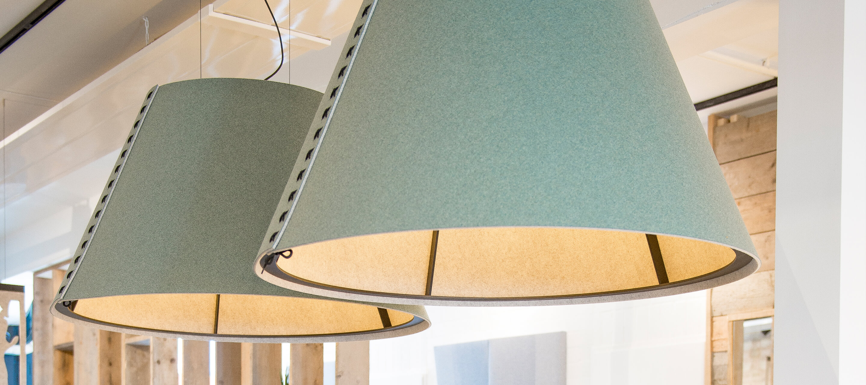 Haworth Light Design Guide showing lamps hanging from a ceiling above an office table