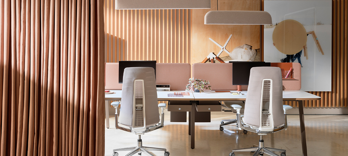 Discover thoughtfully designed mock-up spaces where individual seating solutions seamlessly merge style with comfort. The workspace features ergonomic chairs, adjustable desks, and collaborative seating arrangements, all designed to foster a productive and comfortable environment. Decorative elements such as plants and artwork add to the aesthetic appeal, making the space both professional and inviting.
