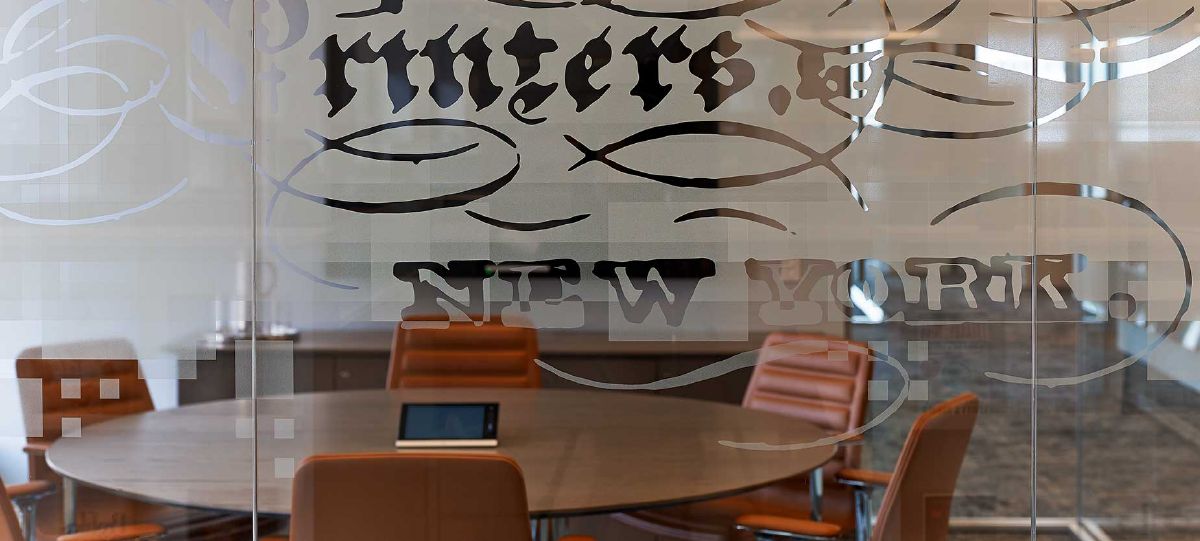 Enclose walls and Lotus chairs in a private conference room at Haworth's HarperCollins client space.