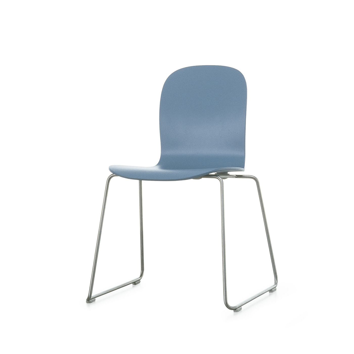 Stackable chair and stool with base in satined stainless steel. Seat in beech plywood veneered with natural or ebony-stained oak or macroter lacquered in the colours of the collection. Also available with fixed cover in fabrics or leathers of the collection. Feet in grey polypropylene.