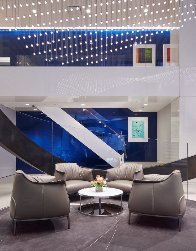 Haworth Archibald grey leather lounge chair in a blue reception area