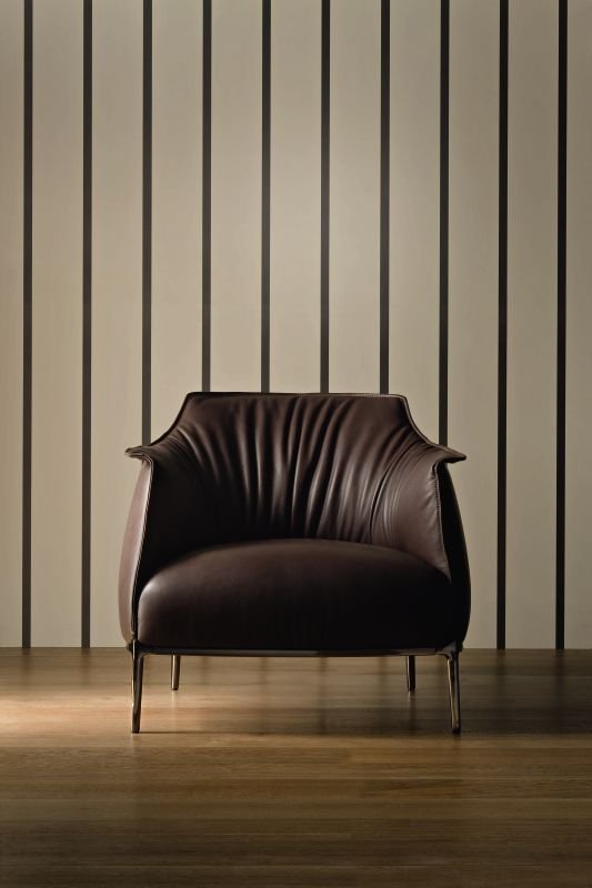 Haworth Archibald brown leather lounge chair with abstract backdrop