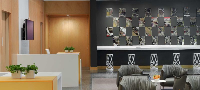 Haworth Archibald green lounge chairs in a reception area