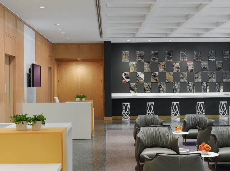 Open waiting area using Haworth Archibald green leather lounge chairs