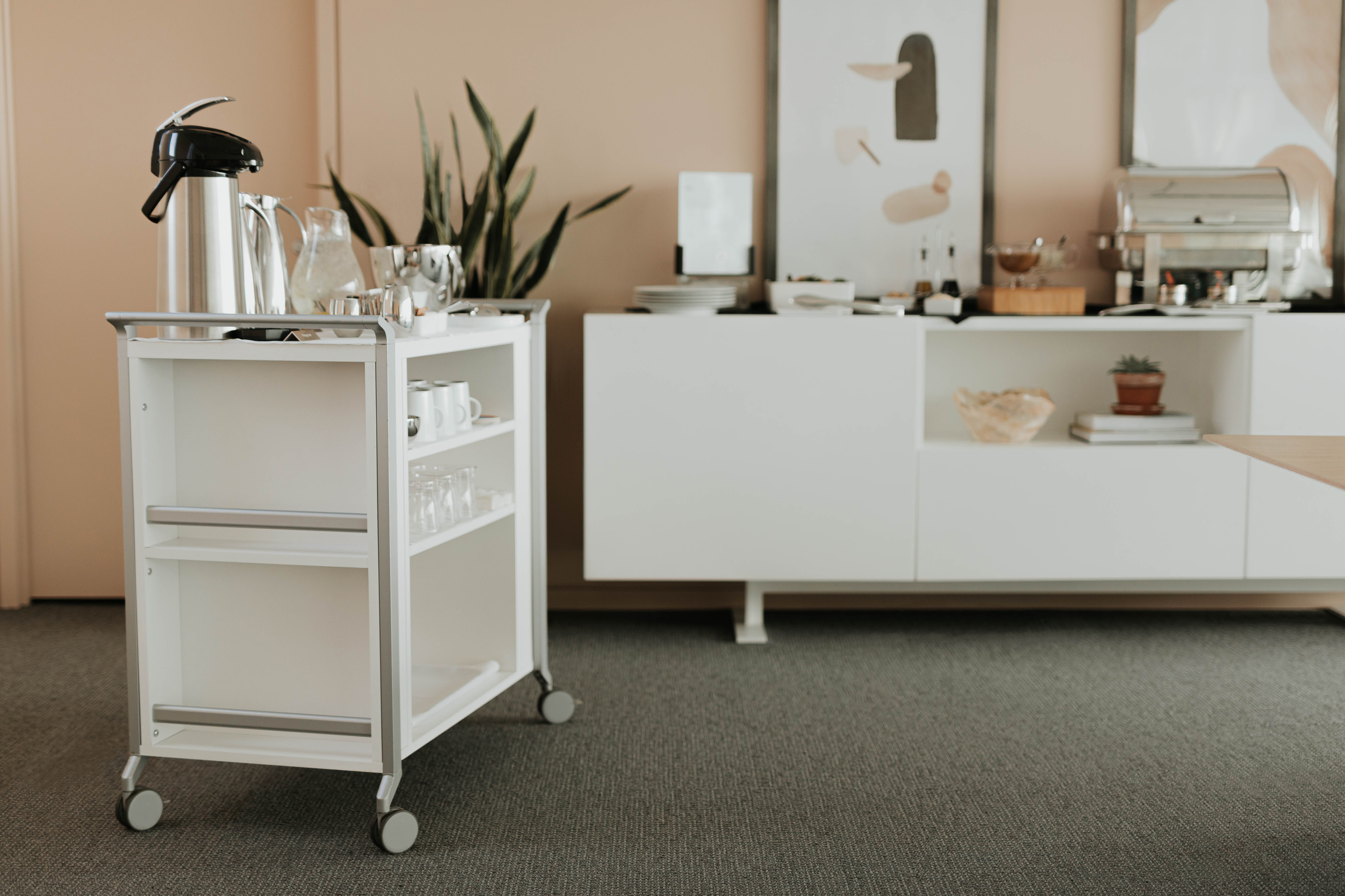Planes catering cart with Luxor low cabinet with two doors, one open shelf, and one drawer
