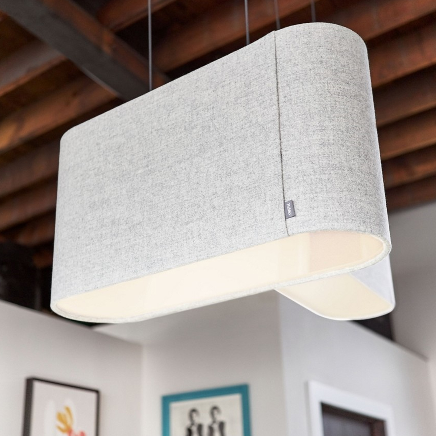 Haworth Belmont Lighting in white color in office space with wooden beams and light fixture coming down from them on wire