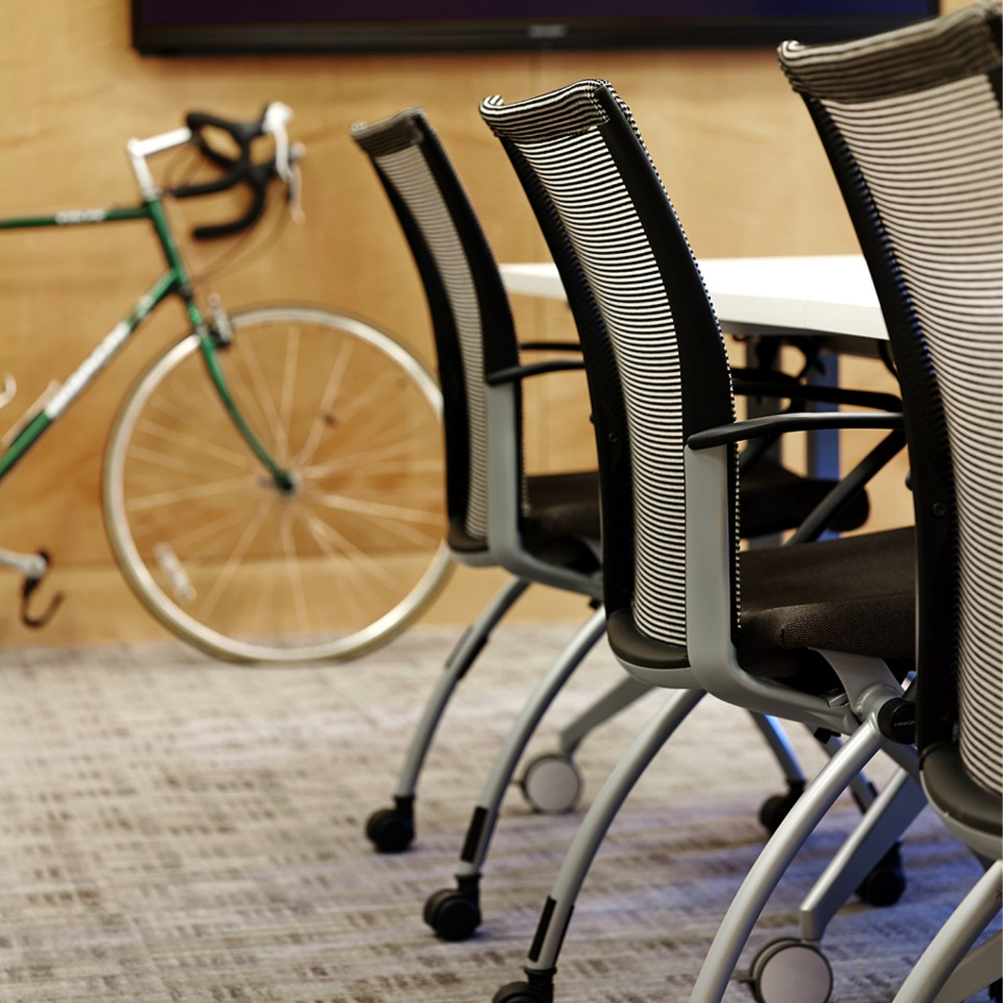 Three X99 Seminar chairs in a seminar room  
