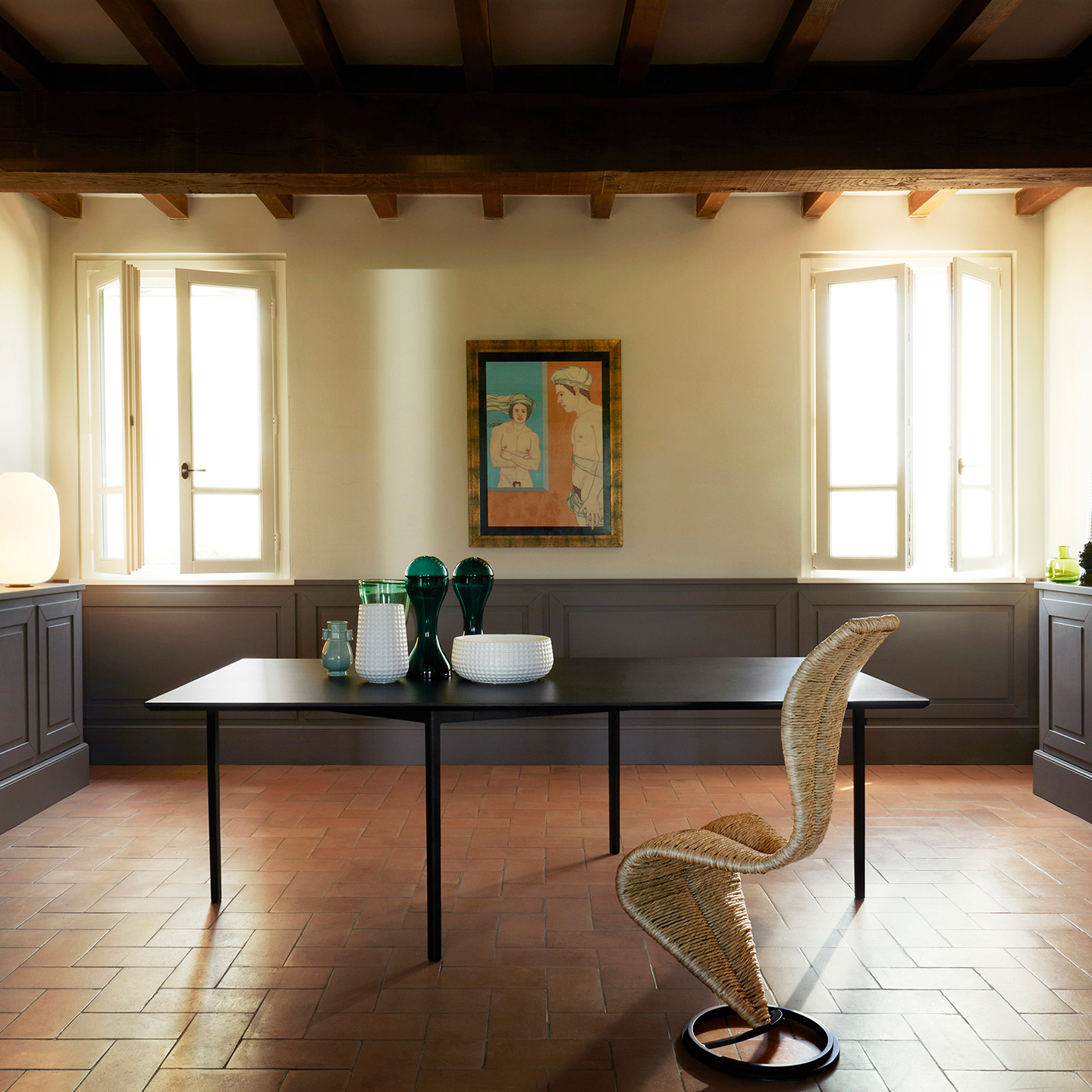 OpenUp meeting table is made of a base of laser-cut painted metal and a top in ash plywood.